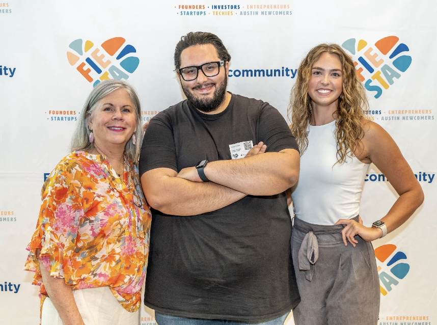 Ghazi with two tech startup founders at a startup networking event. 